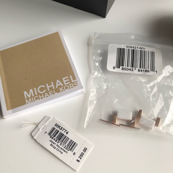 Micheal Kors white and gold watch main image 4